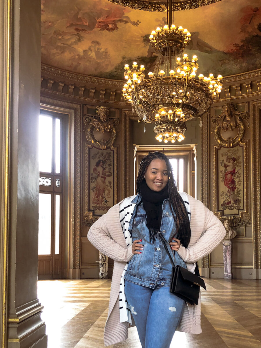 black girl inside Paris opera house Palais Garnier